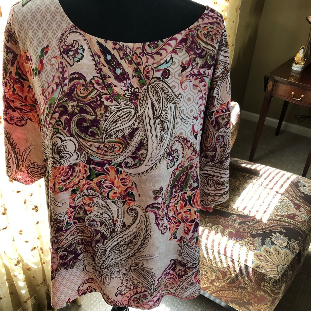 Chico’s reversible top...size 3...slightly worn